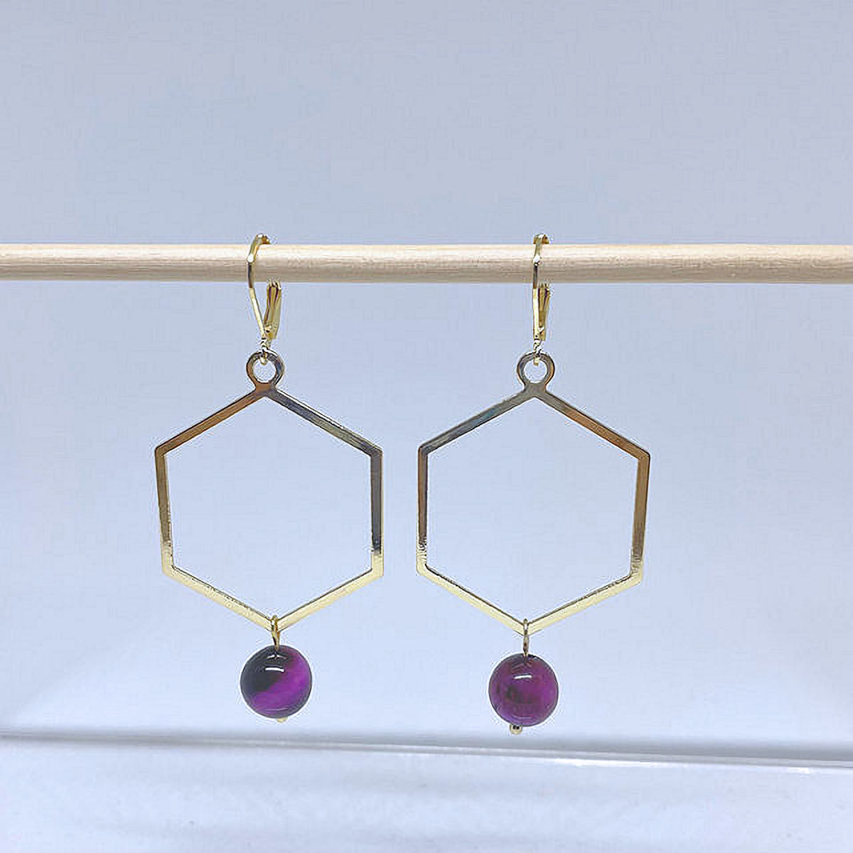 Geometric Shape dangling earrings accented with Purple Tiger Eye Bead