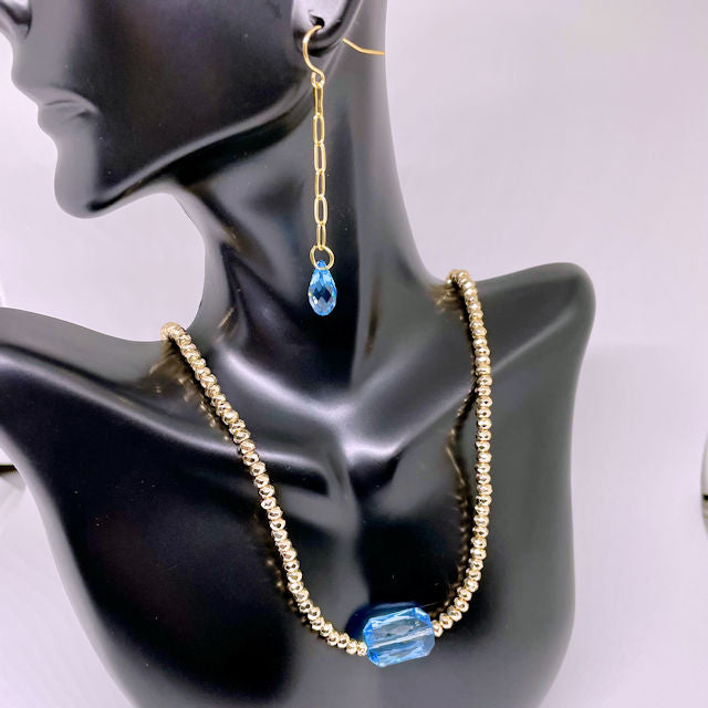 Gold Faceted Hematite Necklace with Blue Rectangle Crystal and Drop Earrings with Blue Crystal