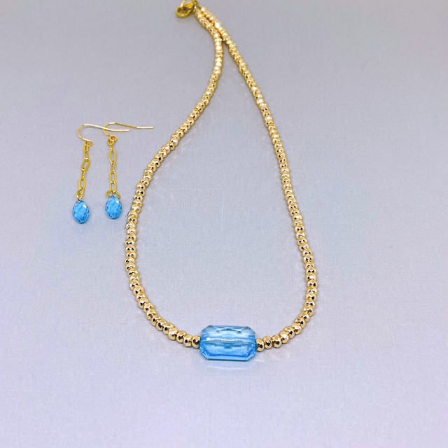Gold Faceted Hematite Necklace with Blue Rectangle Crystal and Drop Earrings with Blue Crystal