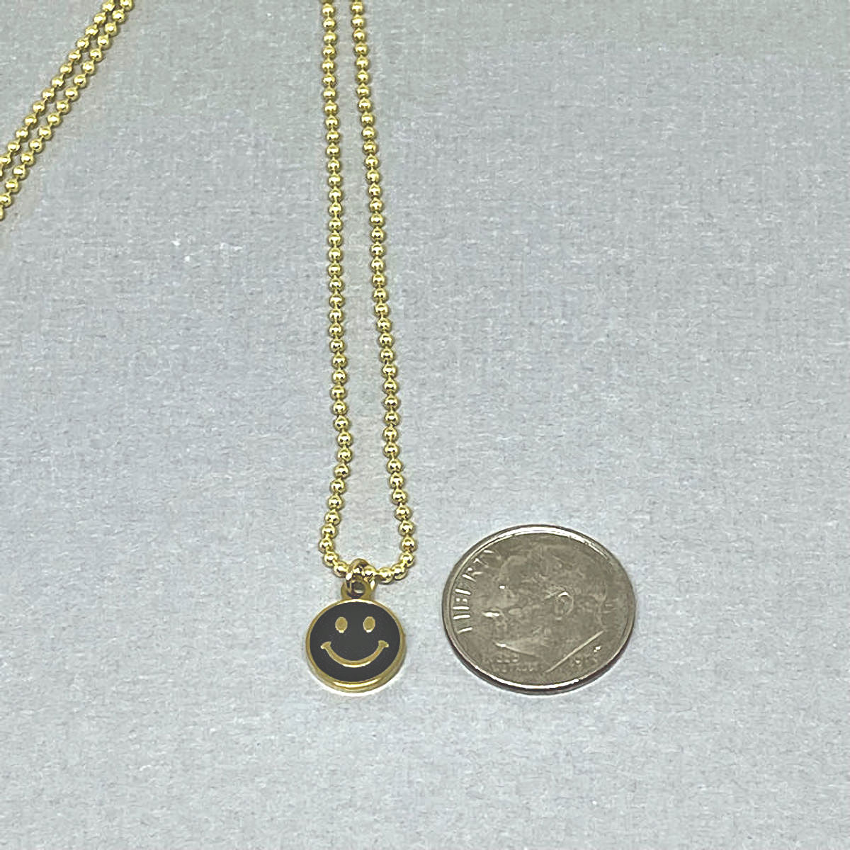Mini Stainless Steel Smile Charm on Gold Plated Chain