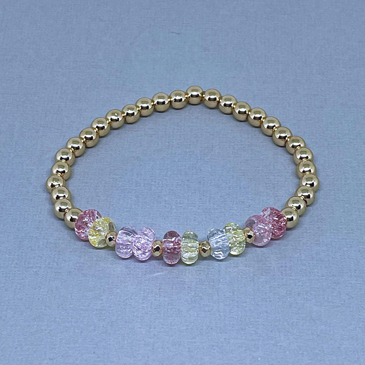 Round Hematite Stretch Bracelet accented with Rondelle Cracked Crystal Beads