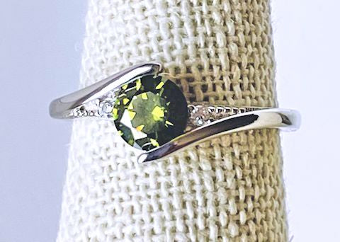 Cubic Zirconia Peridot Ring Accented with Clear CZ Stones