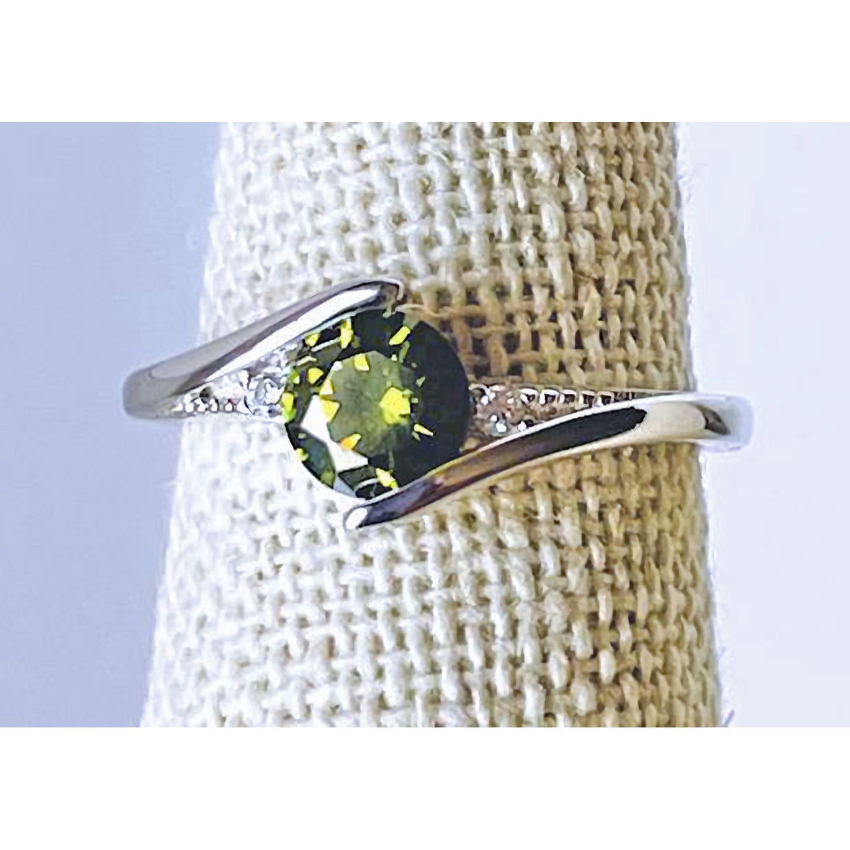 Cubic Zirconia Peridot Ring Accented with Clear CZ Stones