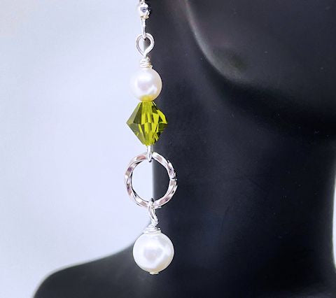 Dangling Pearl Earrings Accented with Green Bicone Crystal