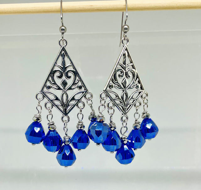 Filigree dangling earrings with Faceted Royal Blue Teardrop crystals