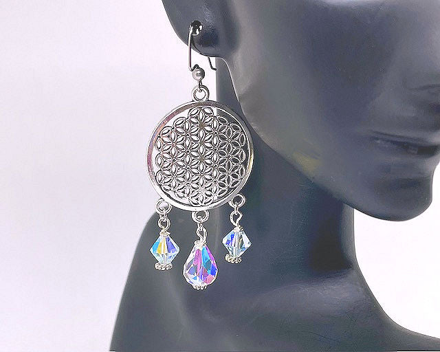 Round Silver Plated Filigree Earrings accented with Electroplated Clear Crystal Beads