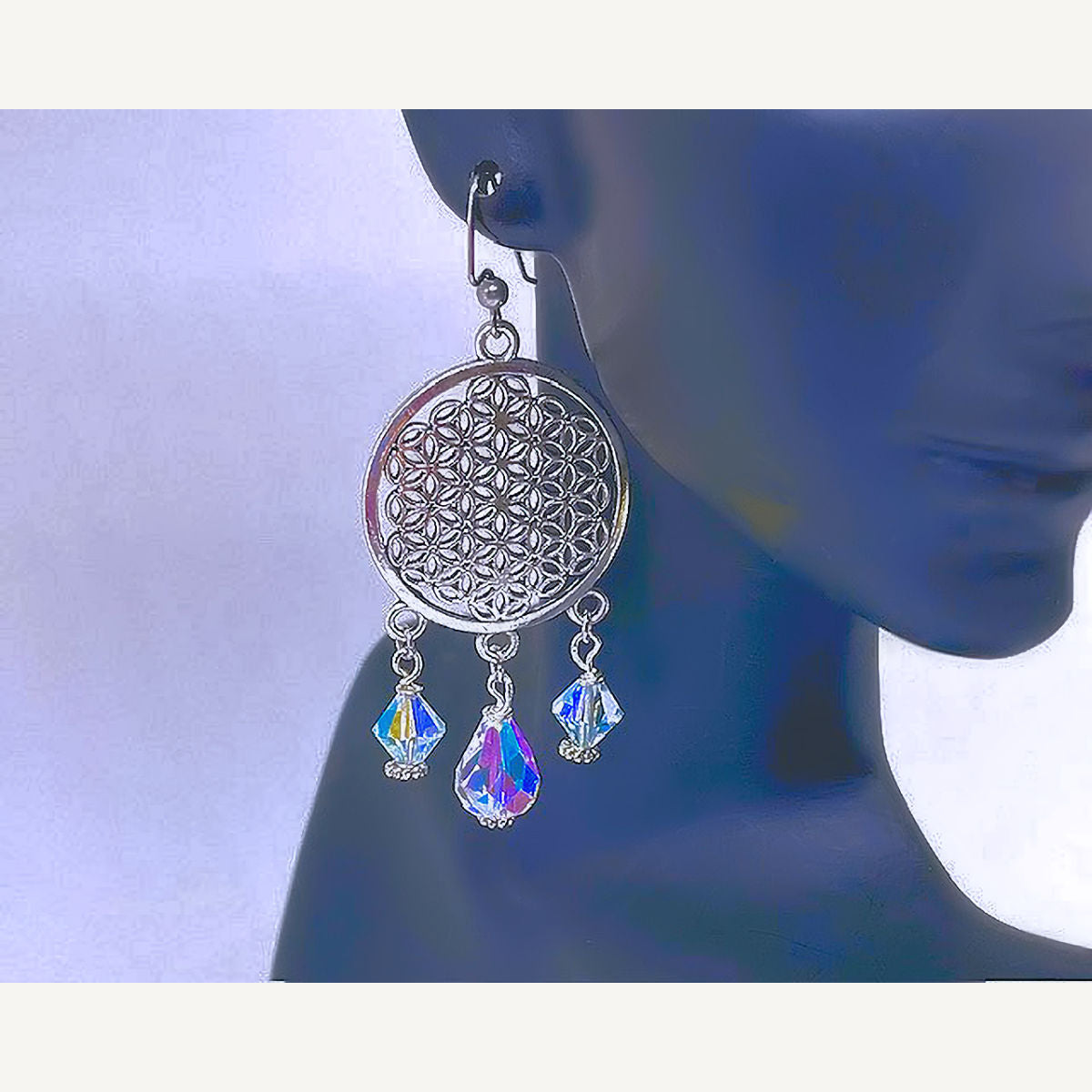 Round Silver Plated Filigree Earrings accented with Electroplated Clear Crystal Beads