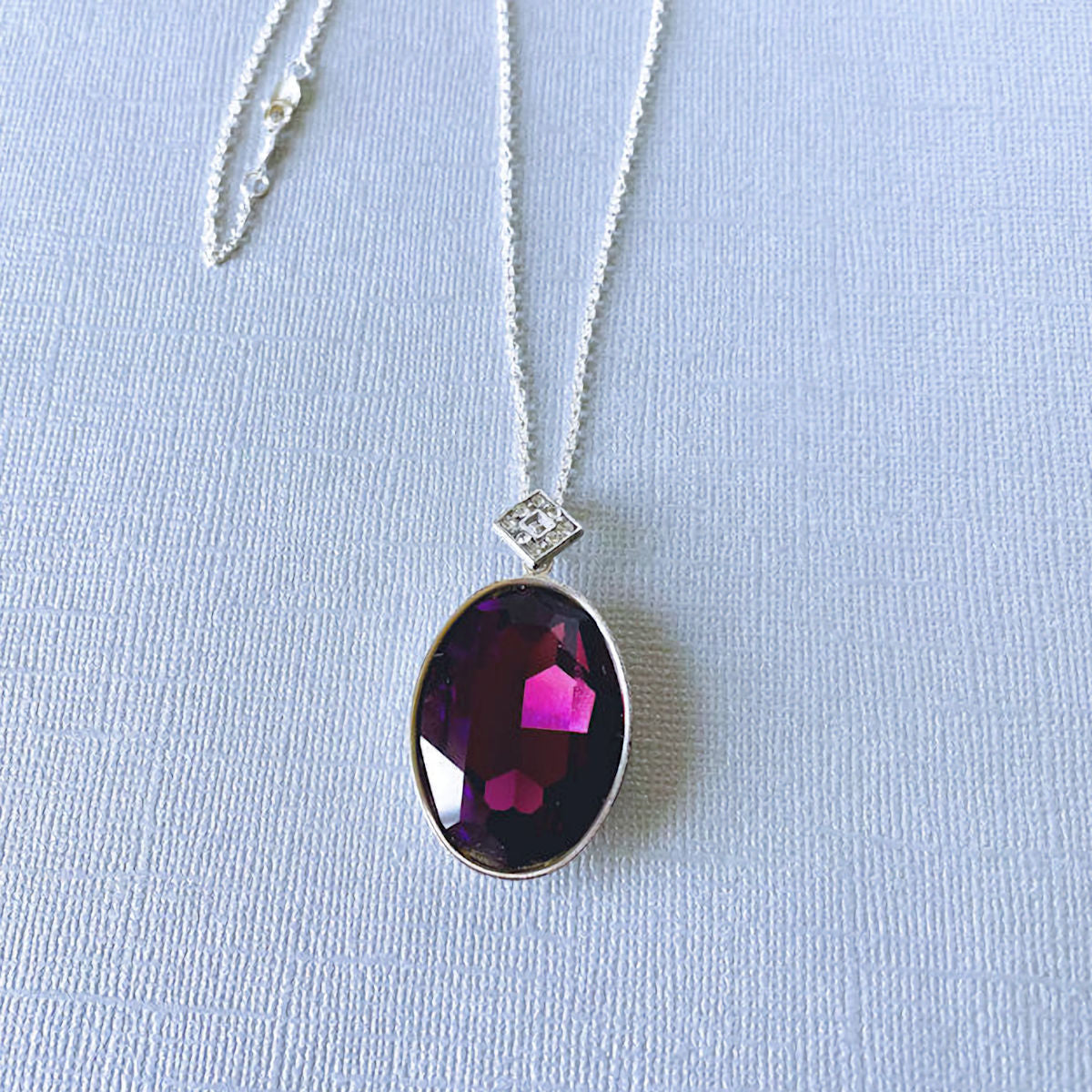 Sterling Silver Necklace with Purple Oval CZ Pendant