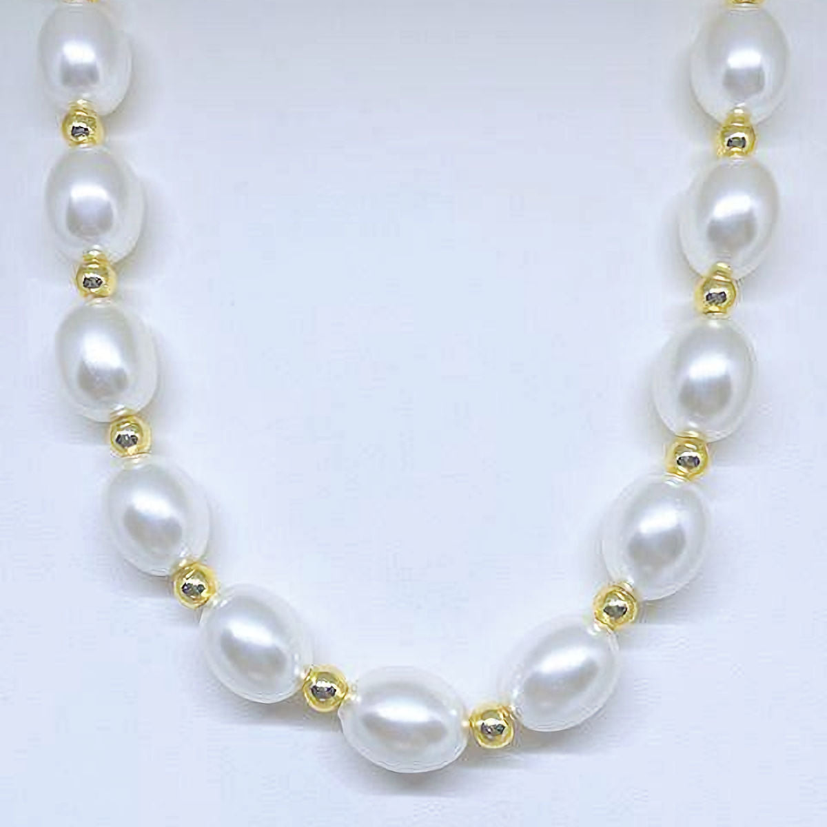 Mother of Pearl Necklace with Gold Hematite Spacers