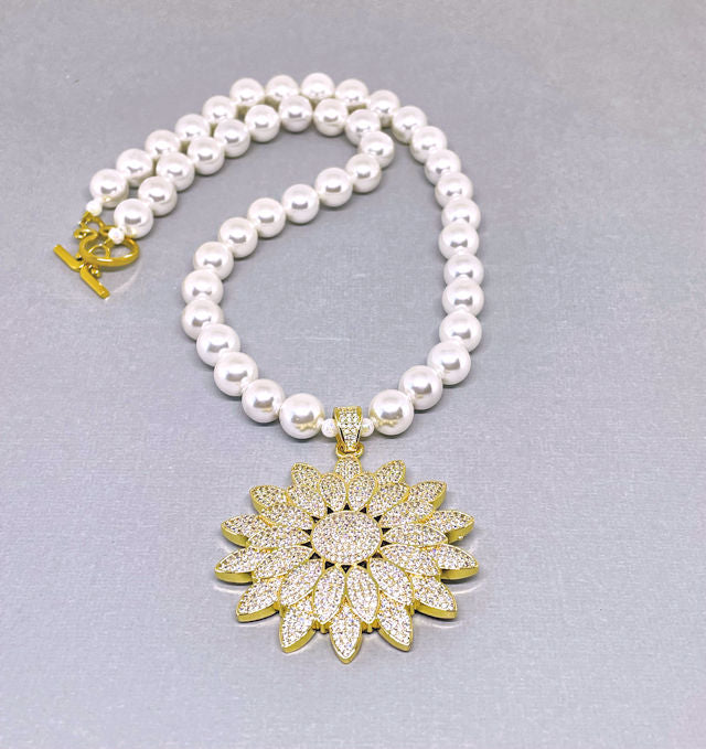 Radiant Elegance: 10mm Pearl Necklace with Gold Pave Sunflower Pendant & Toggle Clasp