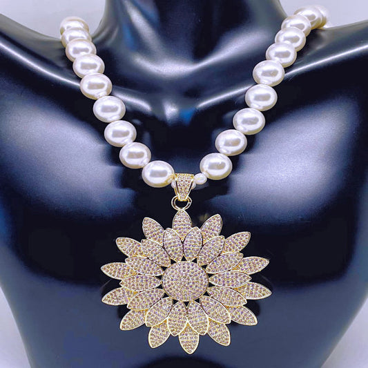 Radiant Elegance: 10mm Pearl Necklace with Gold Pave Sunflower Pendant & Toggle Clasp
