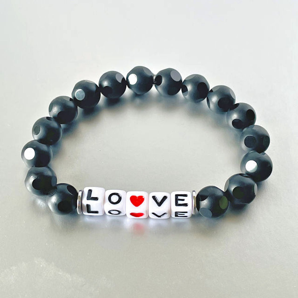 Matte Black Onyx Stretch Bracelet with Love Inscription