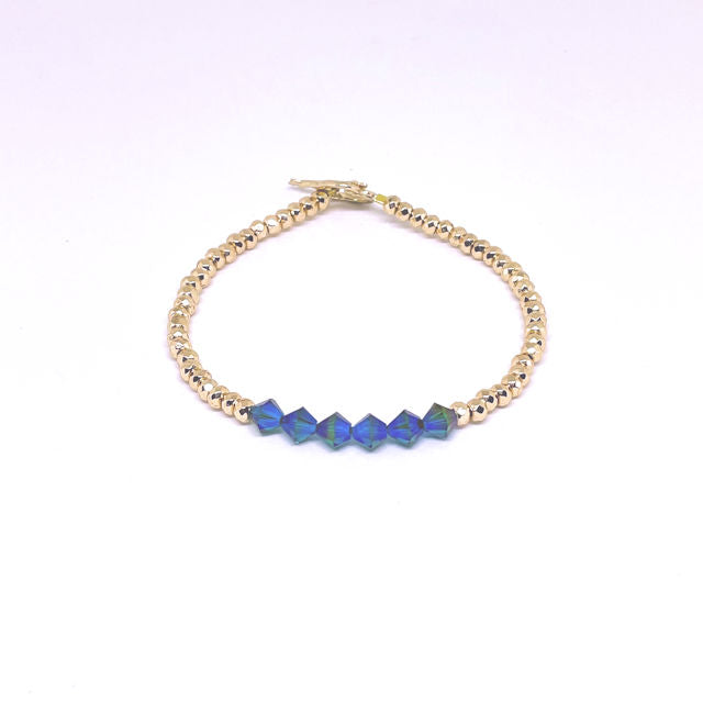 Gold Hematite Bracelet with Faceted Bluish Green Crystal Beads