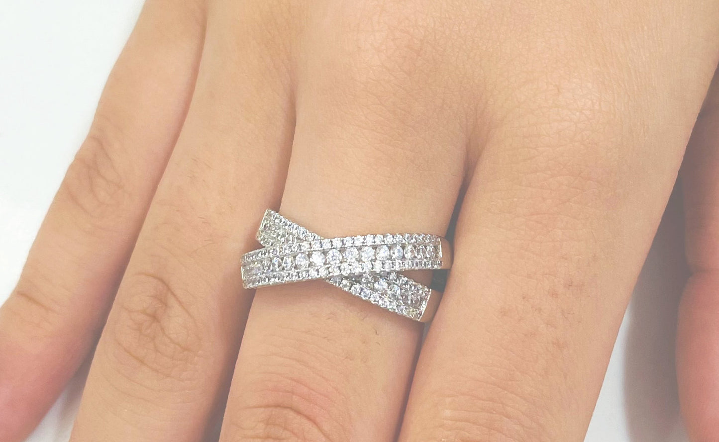 Radiant Elegance: Overlapping Clear Pave CZ Ring